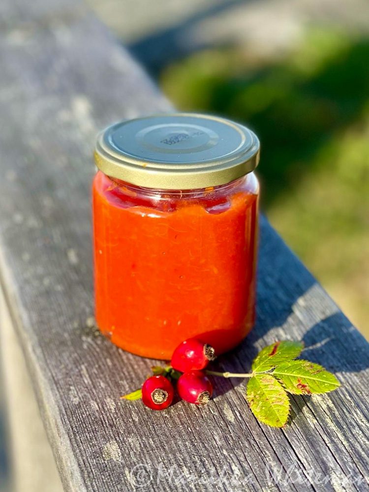Rose hip puree in a glass jar